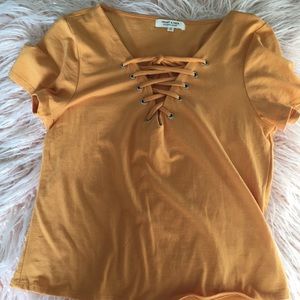 yellow cut-out shirt